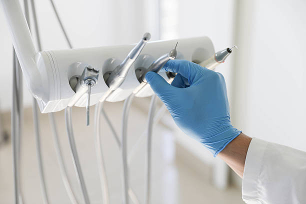 Professional Tooth Extraction technician working in Denton County County, TX